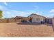 Sun-drenched backyard, featuring a covered patio at 14834 W Calavar Rd, Surprise, AZ 85379