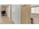 Long hallway with two closets and access to other rooms at 14834 W Calavar Rd, Surprise, AZ 85379