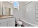 Bathroom features a shower/tub combo and granite countertop at 18103 W Sand Hills Dr, Surprise, AZ 85387