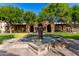 Ornate fountain in a serene community courtyard at 18394 N 97Th Pl, Scottsdale, AZ 85255