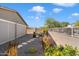 Landscaped backyard with gravel and stepping stones at 18394 W Ipswitch Way, Surprise, AZ 85374