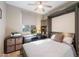 Guest bedroom with a murphy bed and window seat at 18394 W Ipswitch Way, Surprise, AZ 85374