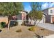 House exterior showcasing a well-maintained yard at 18394 W Ipswitch Way, Surprise, AZ 85374