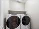 Convenient laundry room with Whirlpool washer and dryer at 18394 W Ipswitch Way, Surprise, AZ 85374