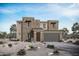 Two-story stucco home with gray garage door and desert landscaping at 26367 S 231St Way, Queen Creek, AZ 85142