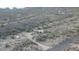 Aerial view of desert property with home and surrounding land at 26956 N Shirley Rd, San Tan Valley, AZ 85143