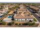 Aerial view of the house, highlighting its backyard oasis with a refreshing pool at 3022 E Warbler Rd, Gilbert, AZ 85297