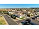 Aerial view showcasing a house's location in a residential neighborhood at 3022 E Warbler Rd, Gilbert, AZ 85297