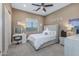 Bright bedroom with a comfortable bed and plenty of natural light at 3022 E Warbler Rd, Gilbert, AZ 85297