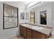 Double vanity bathroom with large mirror and window at 435 W Midland Ln, Gilbert, AZ 85233