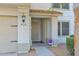 Front entry with decorative door and walkway at 435 W Midland Ln, Gilbert, AZ 85233