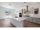 Modern kitchen with quartz countertops, stainless steel appliances, and an island at 44623 N 44Th Dr, Phoenix, AZ 85087