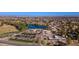 Aerial view showing community amenities including a lake and golf course at 4529 W Continental Dr, Glendale, AZ 85308