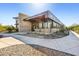 Modern community building exterior with stone and metal accents at 5837 E Ringtail Way, Phoenix, AZ 85054