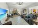 Relaxing living room with a fireplace and comfortable seating at 6604 W Altadena Ave, Glendale, AZ 85304