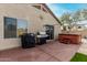 Outdoor patio with hot tub, grill, and plenty of space for entertaining at 6906 E Sisso Pl, Florence, AZ 85132