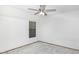 Simple bedroom with ceiling fan and window at 1137 S 131St St, Gilbert, AZ 85233