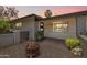 Inviting front patio with fire pit and modern design at 1310 W Pasadena Ave, Phoenix, AZ 85013