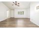 Bright bedroom with wood-look flooring and ceiling fan at 1822 E Linda Ln, Gilbert, AZ 85234