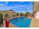 Relaxing rectangular pool with water features at 3301 W Belmont Ave, Phoenix, AZ 85051