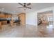 Open concept kitchen with island and living room view at 3334 E Desert Cove Ave, Phoenix, AZ 85028