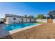 Clean lines and refreshing blue water characterize this inviting backyard pool at 3334 E Desert Cove Ave, Phoenix, AZ 85028