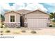 One-story home with two-car garage and desert landscaping at 40010 W Elm Dr, Maricopa, AZ 85138