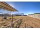 Large backyard with horse stables and a covered area at 4072 E Weston Ln, San Tan Valley, AZ 85140