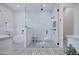 Spa-like bathroom with a large walk-in shower, soaking tub, and patterned floor at 4072 E Weston Ln, San Tan Valley, AZ 85140