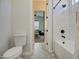 Bathroom with white subway tile and patterned floor at 4072 E Weston Ln, San Tan Valley, AZ 85140