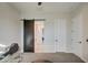 Bedroom with barn door and view into bathroom at 4072 E Weston Ln, San Tan Valley, AZ 85140