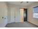 Bedroom with barn door leading to en-suite bathroom at 4072 E Weston Ln, San Tan Valley, AZ 85140