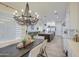Bright dining room with chandelier and view into kitchen at 4072 E Weston Ln, San Tan Valley, AZ 85140