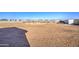 Backyard with round pen and multiple horse stalls at 4072 E Weston Ln, San Tan Valley, AZ 85140