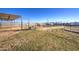 View of several horse stalls and a shaded area at 4072 E Weston Ln, San Tan Valley, AZ 85140