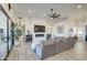 Spacious living room with a large sectional sofa and fireplace at 4072 E Weston Ln, San Tan Valley, AZ 85140