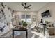 Home office with large floral wall art and modern desk setup at 4072 E Weston Ln, San Tan Valley, AZ 85140