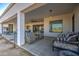 Covered patio with seating area and views of backyard at 4072 E Weston Ln, San Tan Valley, AZ 85140