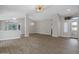 Open concept living area with neutral walls and wood-look tile floors at 4331 E Cortez St, Phoenix, AZ 85028