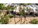 Aerial view showcasing a row of townhouses with private patios and lush landscaping at 4830 N 65Th St, Scottsdale, AZ 85251