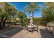 Outdoor patio with table, chairs, and grill at 4830 N 65Th St, Scottsdale, AZ 85251