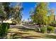 Residential street lined with lush landscaping and homes at 4830 N 65Th St, Scottsdale, AZ 85251