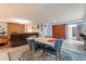 Mid century modern dining area with retro table and chairs at 5250 W Harmont Dr, Glendale, AZ 85302