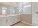 Modern bathroom with double vanity and shower at 5849 E Ringtail Way, Phoenix, AZ 85054