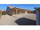 Large backyard, covered patio, gravel, and storage shed at 7275 W Tina Ln, Glendale, AZ 85310