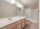 Bathroom with double vanity and shower/tub combo at 7275 W Tina Ln, Glendale, AZ 85310