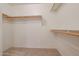 Large walk-in closet with double hanging rods at 7275 W Tina Ln, Glendale, AZ 85310