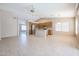 Open kitchen features an island and wood cabinets at 7275 W Tina Ln, Glendale, AZ 85310