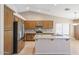 Modern kitchen with granite countertops and stainless steel appliances at 7275 W Tina Ln, Glendale, AZ 85310