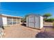Large backyard with shed and patio cover at 1161 S Grand Dr, Apache Junction, AZ 85120